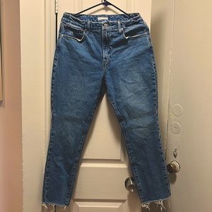 Good American Blue straight leg denim with frayed bottom